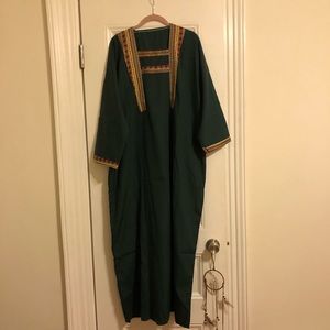 Arabic. A long dress/Thob. Arabic, Middle Eastern, North African.  Casual